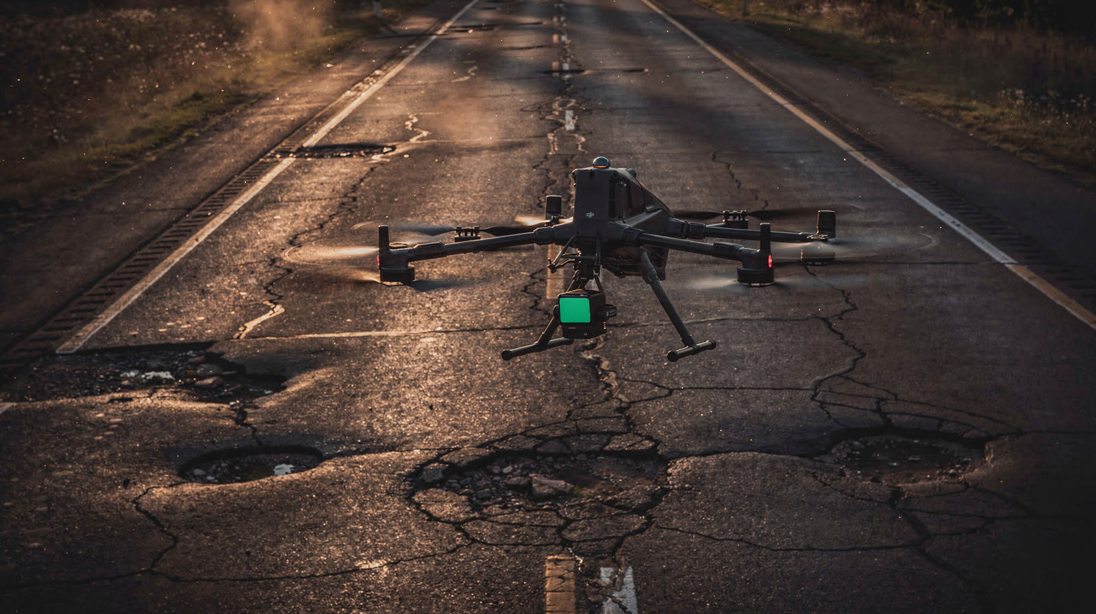 A distressed tarmac section recorded for crack, pothole, and rutting detection across the network.